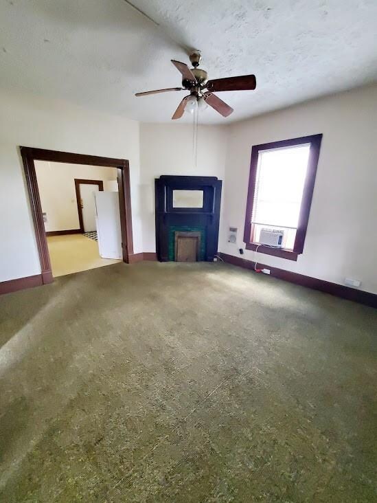 Living room space showing wide doorway entrance in