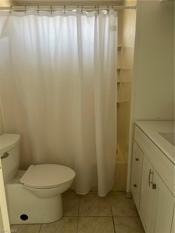 Bathroom with shower / tub combo with curtain, van
