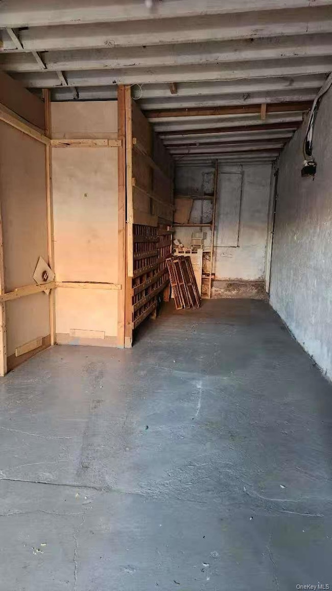 Basement featuring a garage