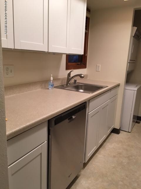 E. 56 New kitchen sink and counter top