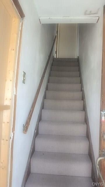 Entry off front porch to second floor unit