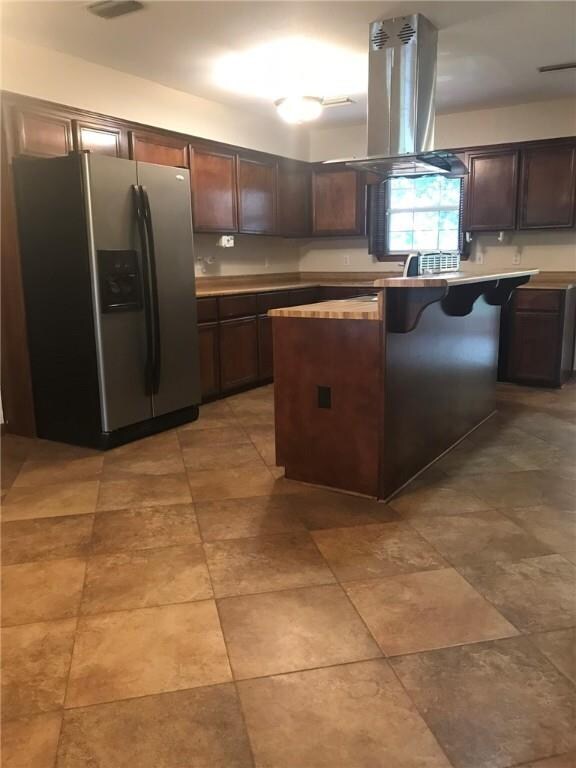 Kitchen with wooden cabinets