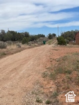 View of yard featuring a view of rural / pastoral area