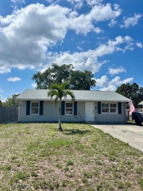 Single story home with driveway