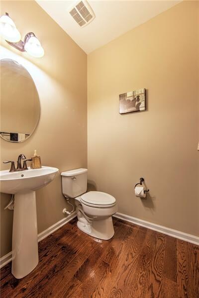 POWDER ROOM:   Conveniently located in the hallway
