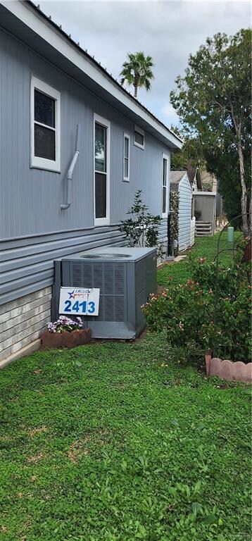 View of yard featuring central AC unit