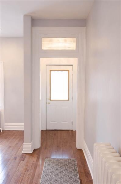 Entry way. Note that transom windows and hardwood 