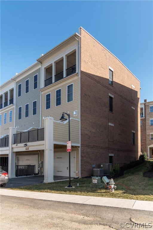 Rear entry to the 2-car garage, with two additonal