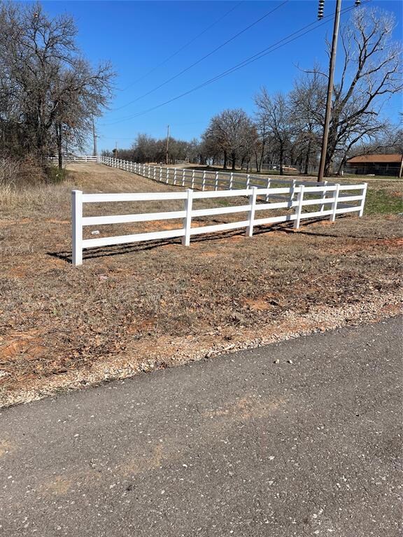 View of gate featuring a rural view
