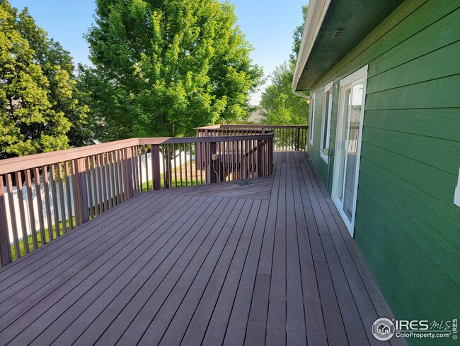 Deck is the length of the back of the home