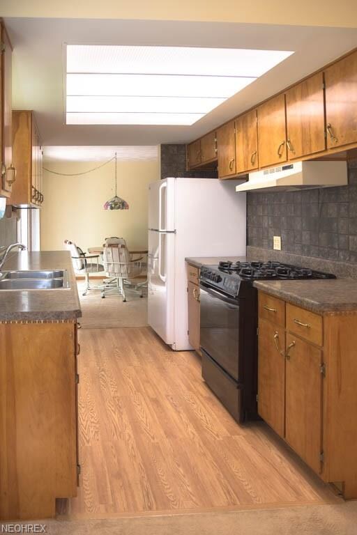 The kitchen opens to the family room and the dinin