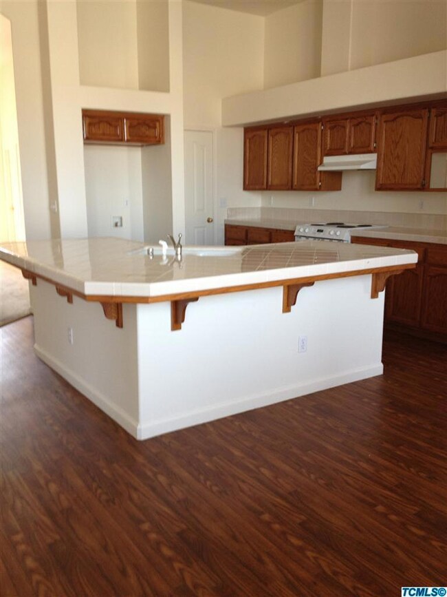 Kitchen includes pantry and island snack