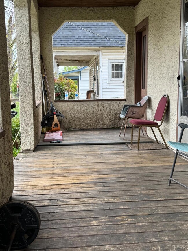 The wide covered front porch goes 24' all the way across the house!