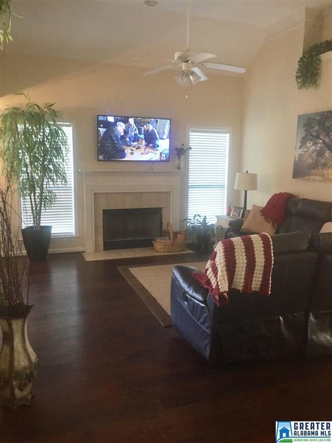 Family Room is open to Dining Room, has hardwood f