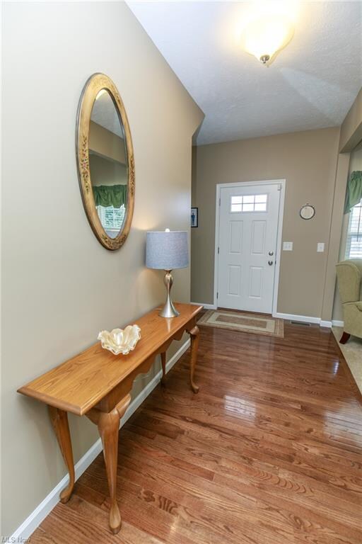 Gleaming Hardwood Floors to Greet Your Guest in th