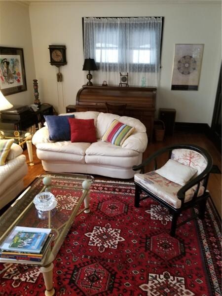 The Expansive Living Room Adapts To Any Style Of F