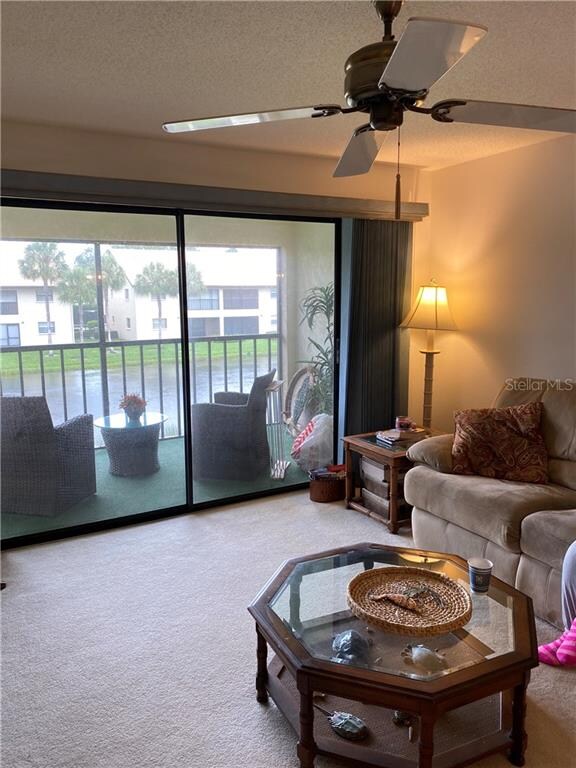 Great room view to the lanai and sparkling water!