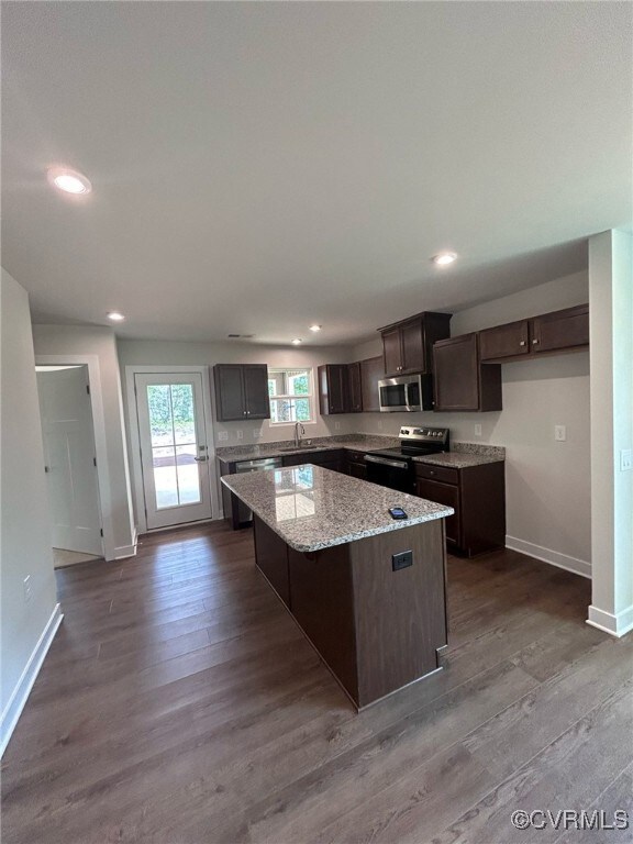 Kitchen with appliances with stainless steel finis