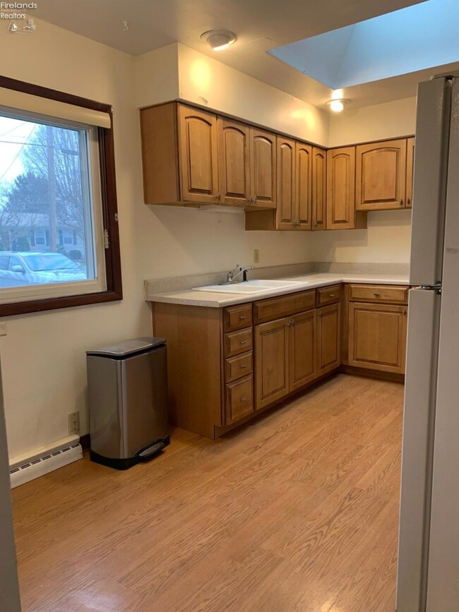 Kitchen with space for island, or small breakfast table.