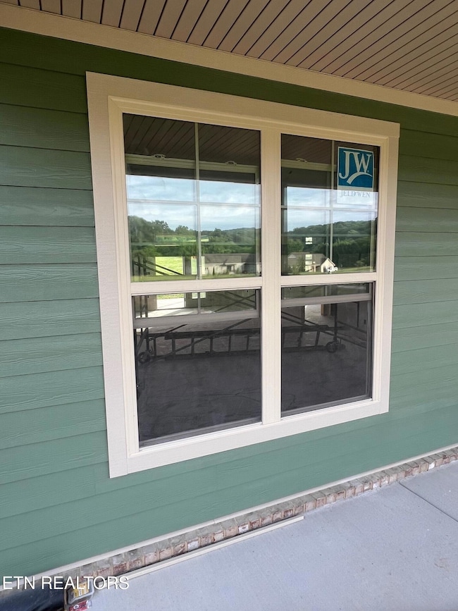 Family Room Windows ( Front Porch View)