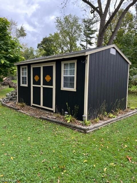 This back yard shed has electric