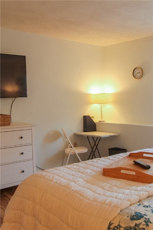 The oversized bedroom has sufficient space to provide a work station for anyone who works or studies from home.