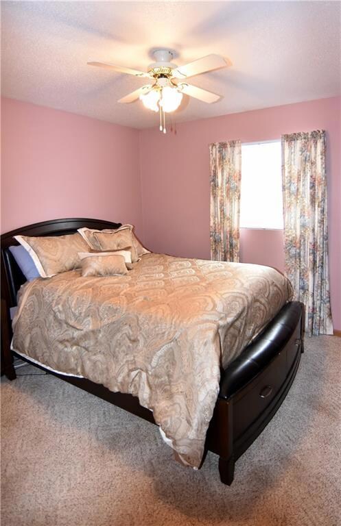 Bedroom with carpet