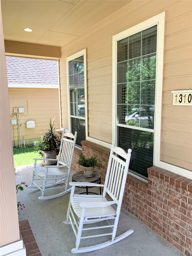 Sit outside on the covered front porch.