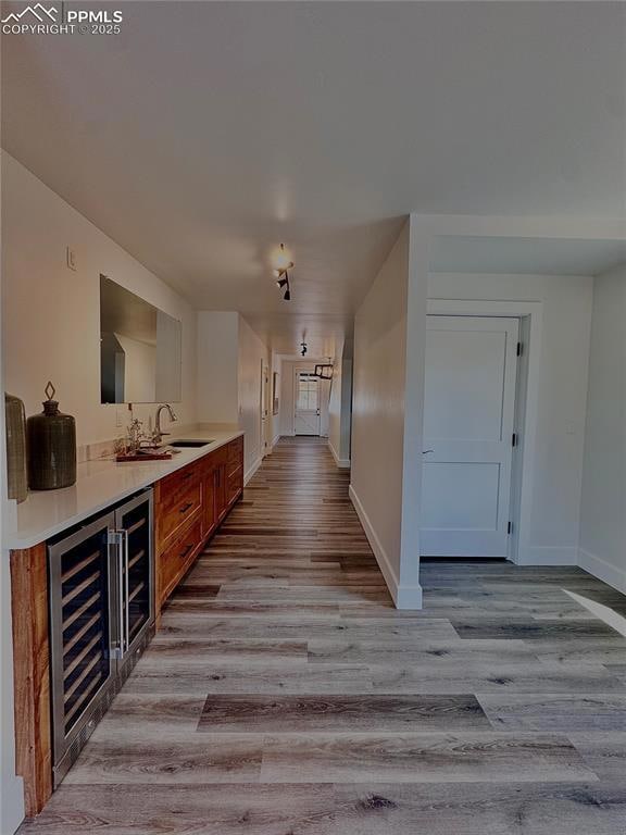 Wet bar near garage entry and walk out to covered 