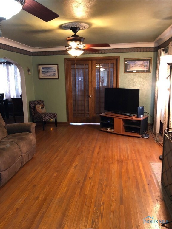 Spacious Living Room with Fireplace, wood floors a