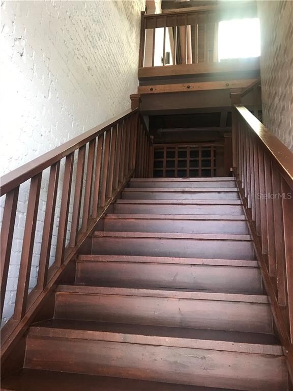 The staircase continue upward on the back side of 