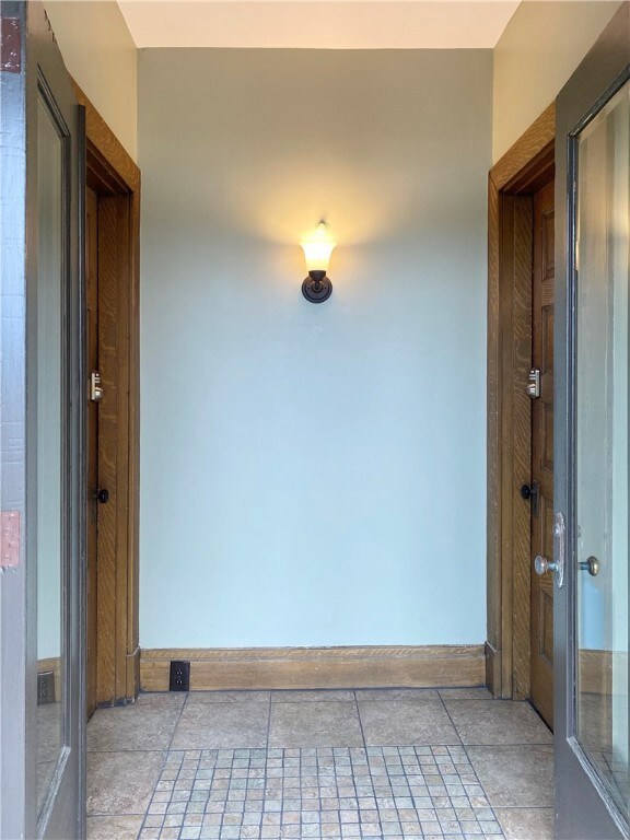Front double doors open to common Entry Foyer.