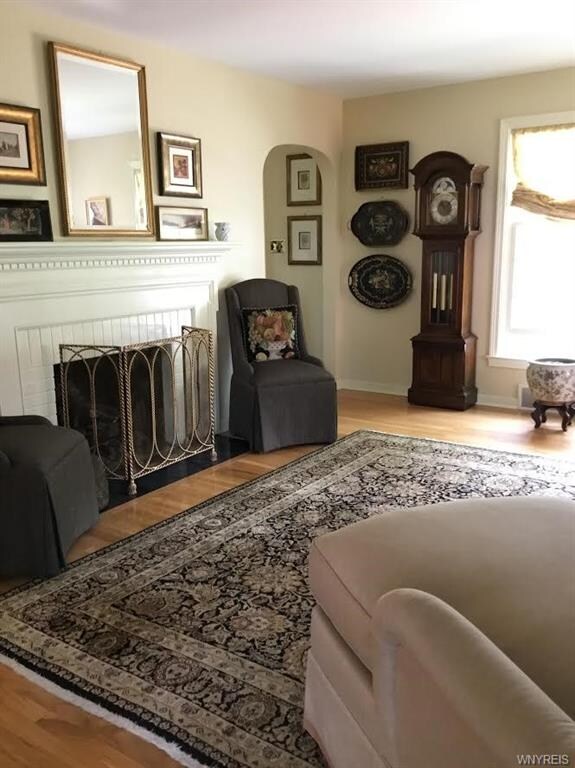 Living room with new gleaming hardwood floors.