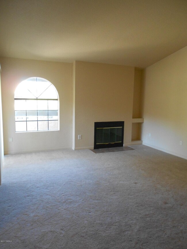 Living room w/wood burning fireplace