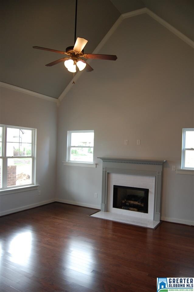 HUGE vaulted ceiling adds so much character to thi