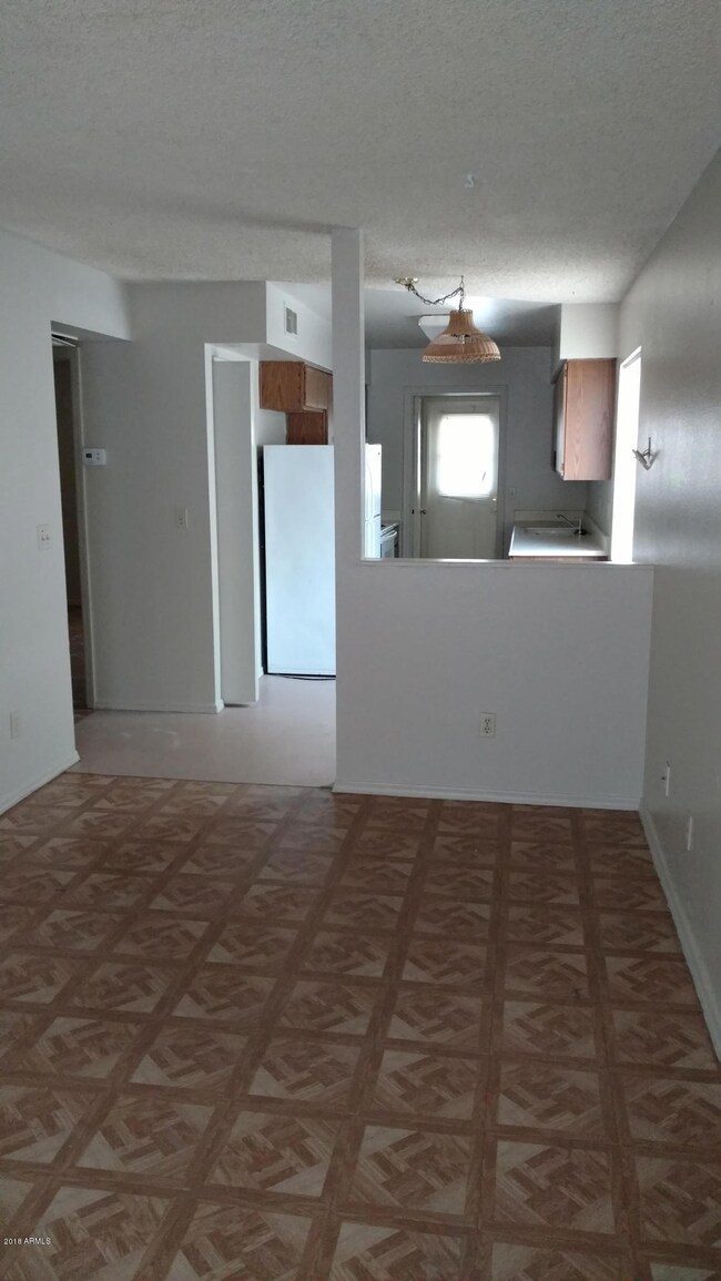 empty unit kitchen livingroom