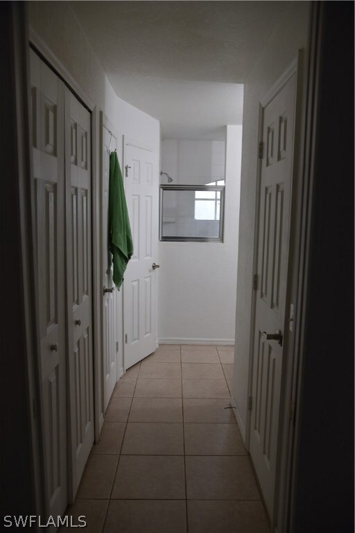 Hall to bathroom. To the right and left walking cl