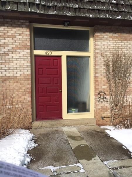 Back parking lot entrance.  Unit is completely lev