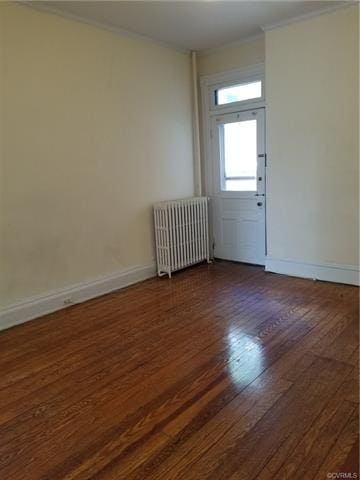 Living room has door to the covered back porch