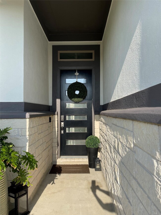 Front entrance with upgraded lovely 8-ft-entrance door