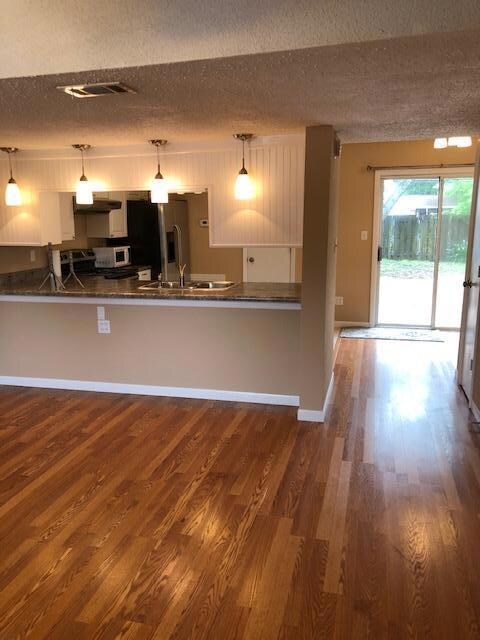 living area with kitchen and dining
