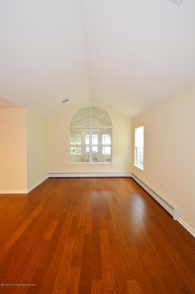 LIVING ROOM WITH CATHEDRAL CEILING