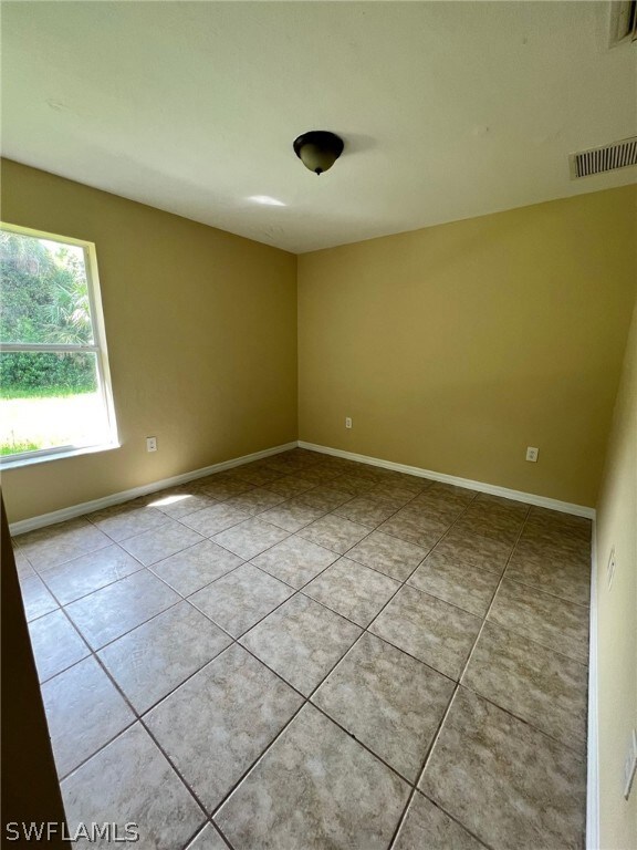1240 Hillcrest St E, Lehigh Acres, FL 33974 - photo 4