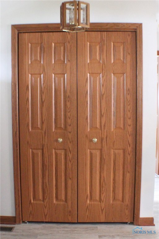 Huge Entry Closet With 6-Panel Doors.