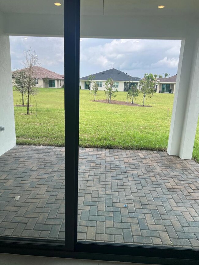 1235 Tangled Orchard Trace, Loxahatchee, FL 33470 - photo 2