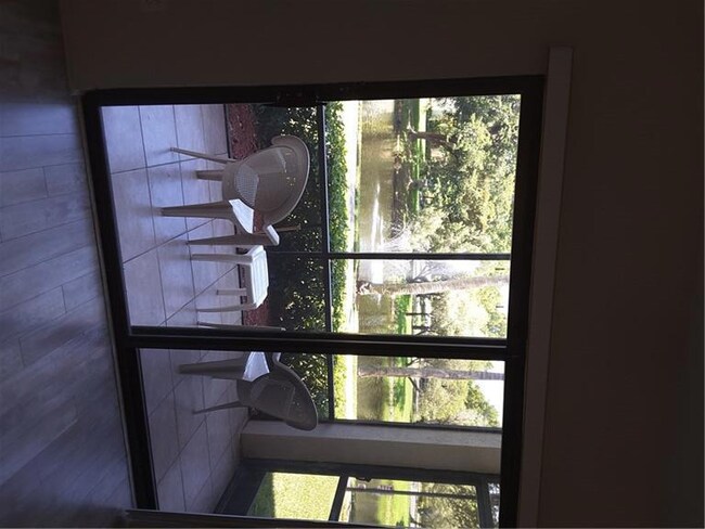 View from living and patio.  Fountain and Lake