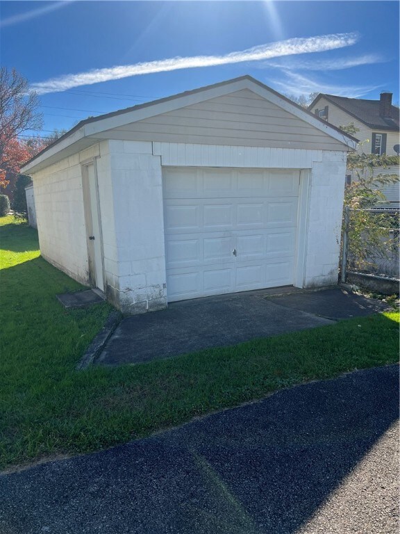 REAR GARAGE RENTED SEPARATELY FOR STORAGE.