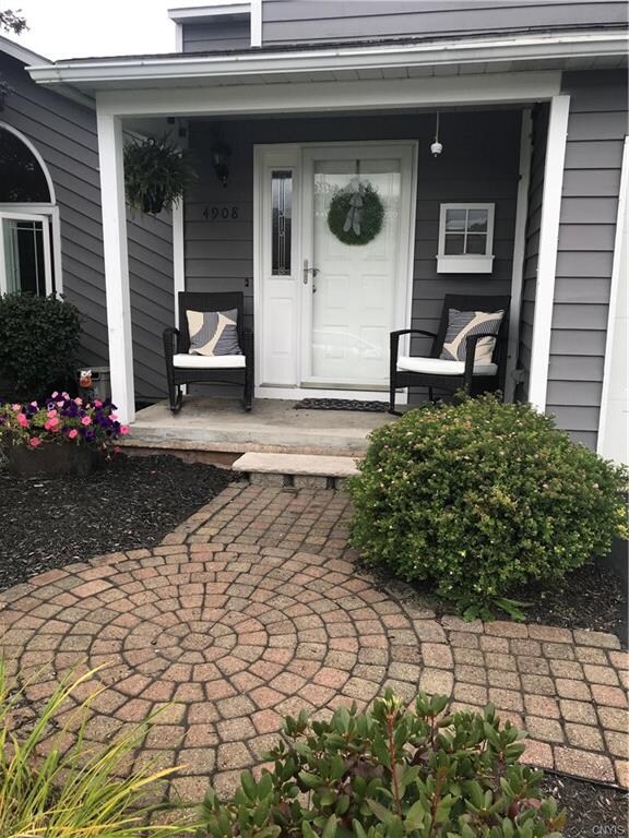 Beautiful brick pavers welcome you as you enter onto the front porch!
