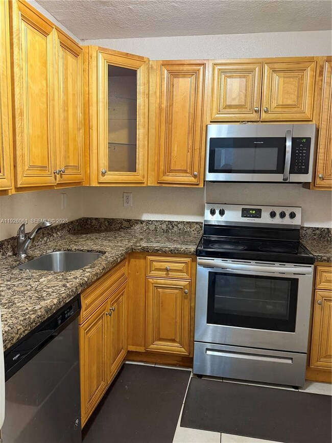 6701 NW 169th St unit B301, Hialeah, FL 33015 - photo 3