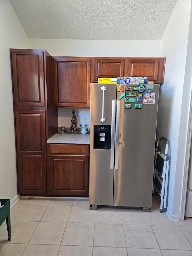 Kitchen with refrigerator